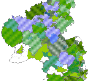 Das Bild zeigt eine Karte von Rheinland-Pfalz, in der Landkreise und Verbandsgemeinden dargestellt sind.