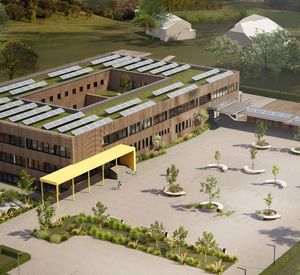 Auf dem Foto ist ein saniertes Schulgebäude zu sehen